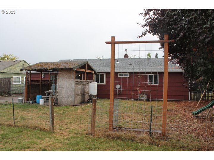 1254 Olympic Street Springfield, OR 97477 - Photo 22 of 30 a view of a house with a backyard
