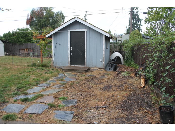 1254 Olympic Street Springfield, OR 97477 - Photo 23 of 30 a view of a house with backyard