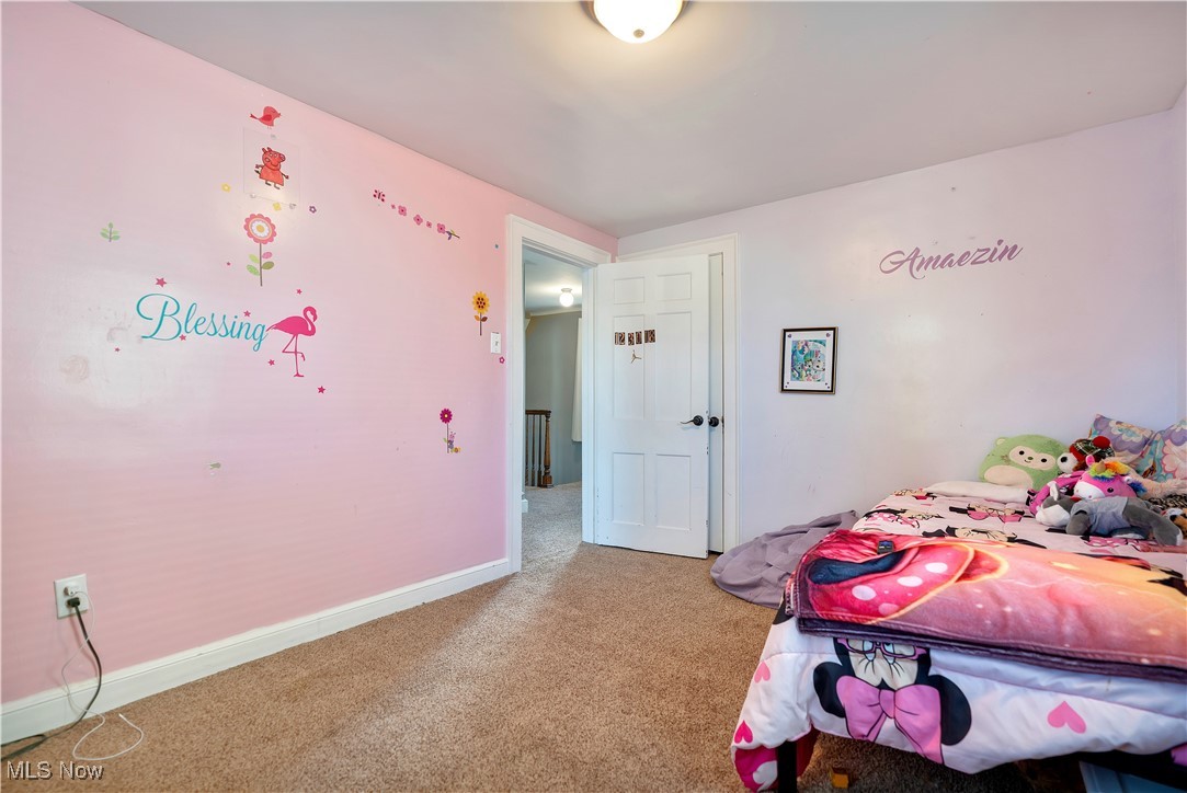 1361 Crescent Road Southwest Canton, OH 44710 - Photo 20 of 36 Carpeted bedroom with baseboards