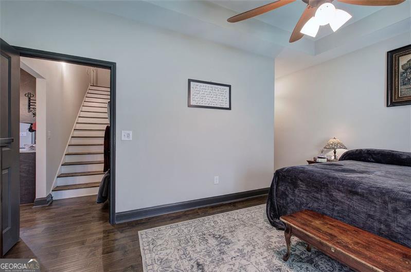 127 Alex Calhoun, GA 30701 - Photo 20 of 53 a bedroom with a bed and wooden floor