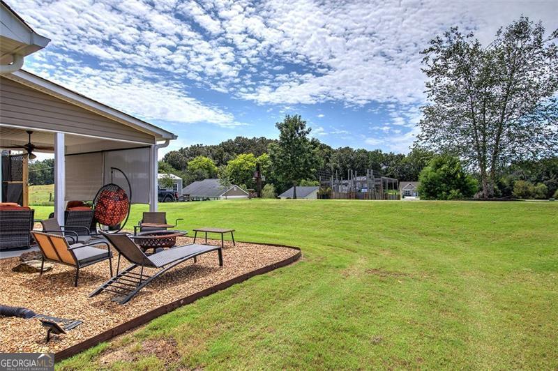 127 Alex Calhoun, GA 30701 - Photo 36 of 53 a view of a house with backyard porch and sitting area