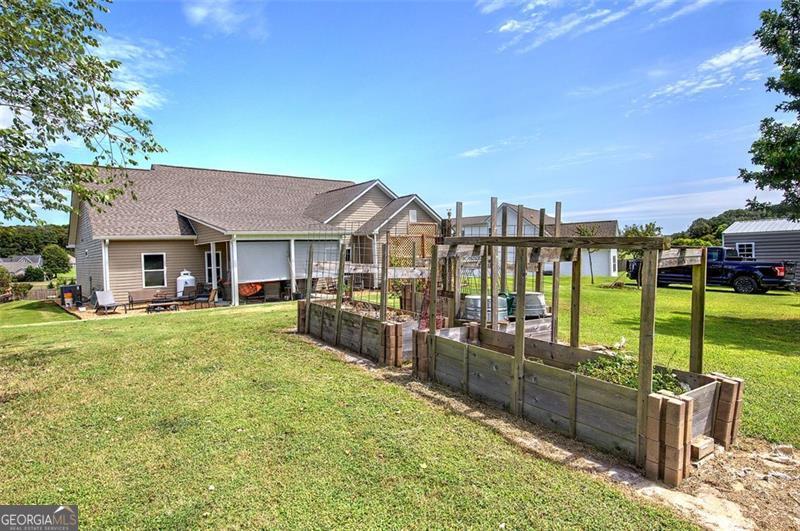 127 Alex Calhoun, GA 30701 - Photo 38 of 53 a view of a house with backyard and porch