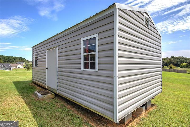 127 Alex Calhoun, GA 30701 - Photo 40 of 53 a view of a back yard of the house