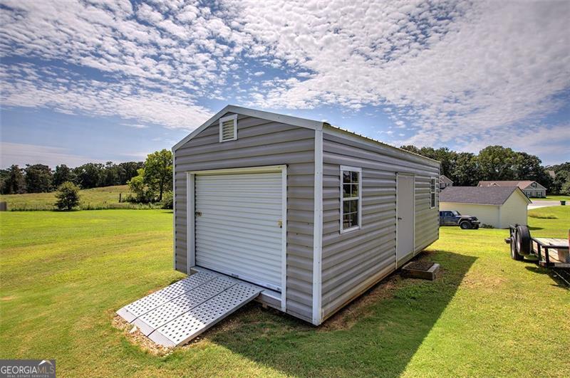 127 Alex Calhoun, GA 30701 - Photo 41 of 53 a view of a backyard with sitting area