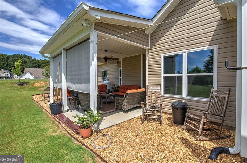 127 Alex Calhoun, GA 30701 - Photo 43 of 53 a view of house with backyard and outdoor seating