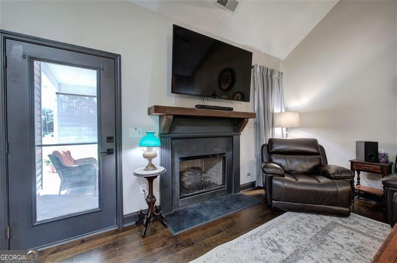 127 Alex Calhoun, GA 30701 - Photo 10 of 53 a living room with furniture and a fireplace