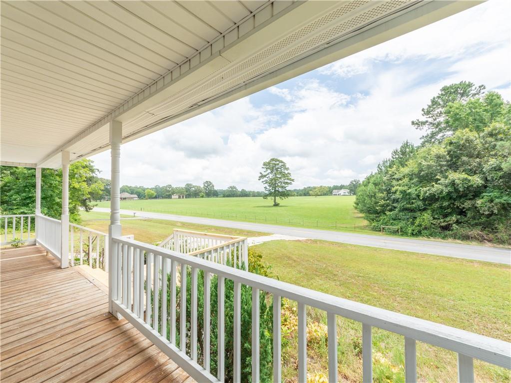 2 Buck Trail Rome, GA 30165 - Photo 1 of 1 a view of balcony with yard and mountain in the background