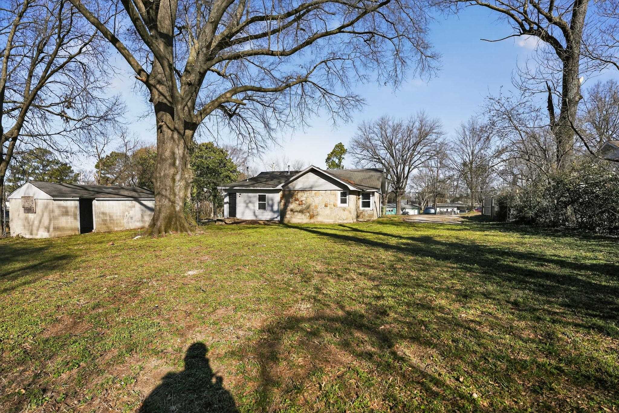 4043 Clearpool Circle Road Memphis, TN 38118 - Photo 1 of 33 View of grassy yard