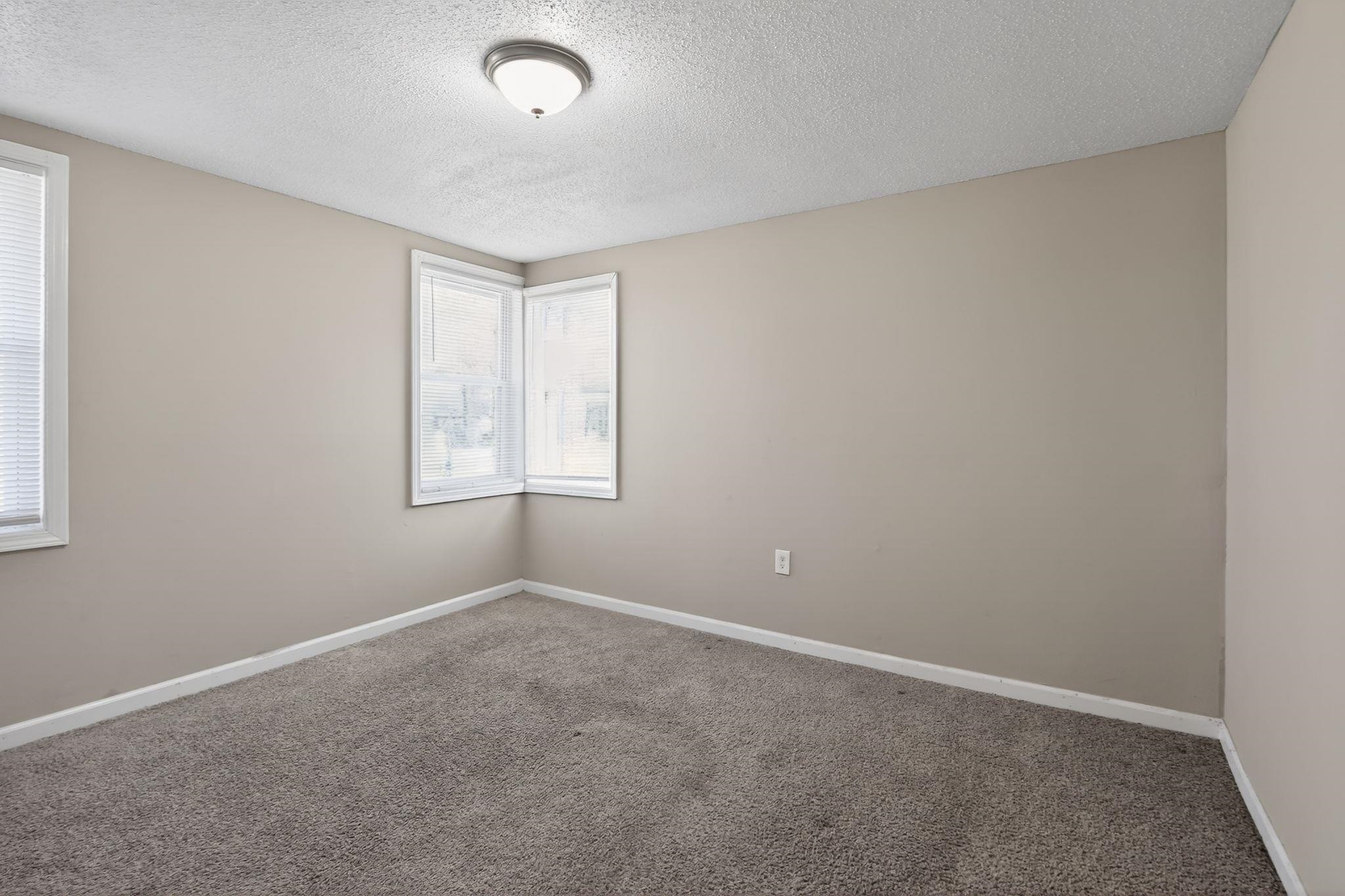 4043 Clearpool Circle Road Memphis, TN 38118 - Photo 13 of 33 an empty room with windows