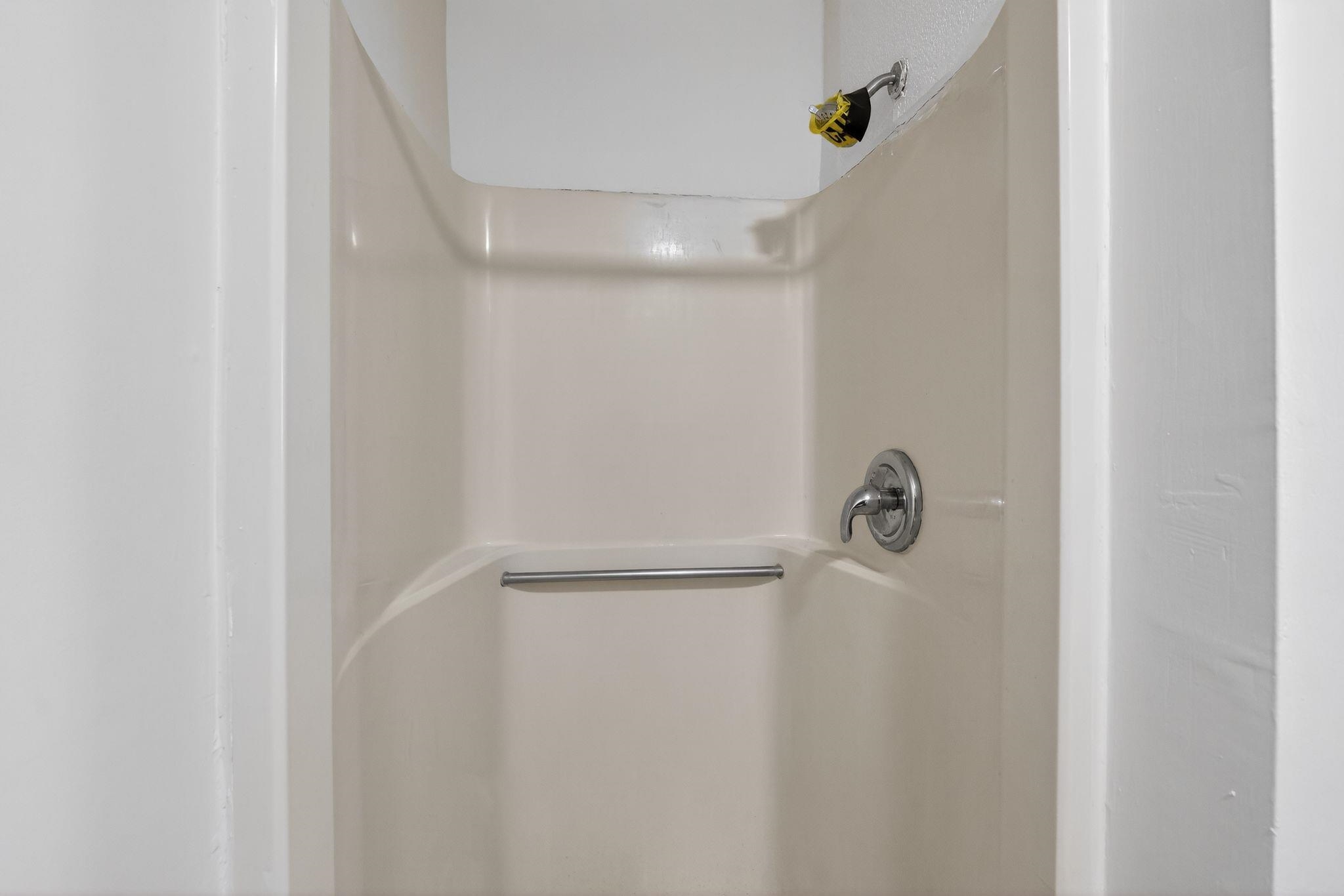 4043 Clearpool Circle Road Memphis, TN 38118 - Photo 18 of 33 Bathroom view of a stall shower