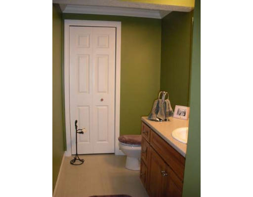 30 Caspian Way, Unit 30 Fitchburg, MA 01420 - Photo 8 of 10 a bathroom with a sink toilet and vanity