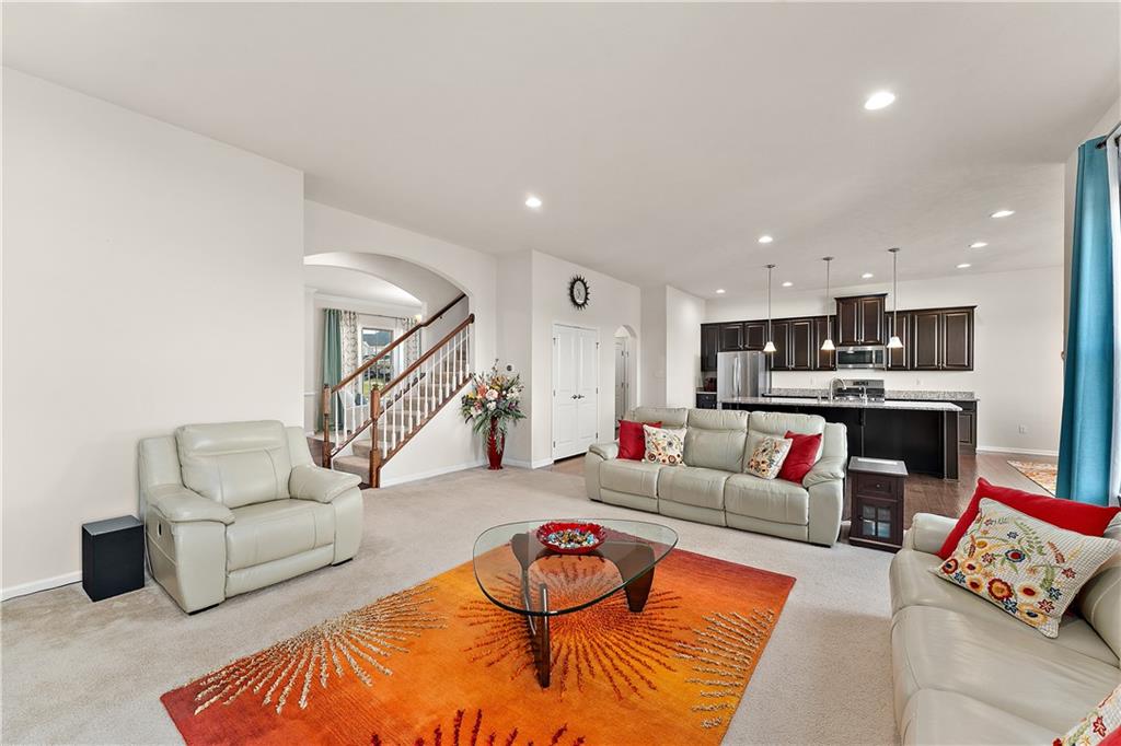 817 Oneida Circle Mars, PA 16046 - Photo 14 of 50 a living room with furniture and kitchen view
