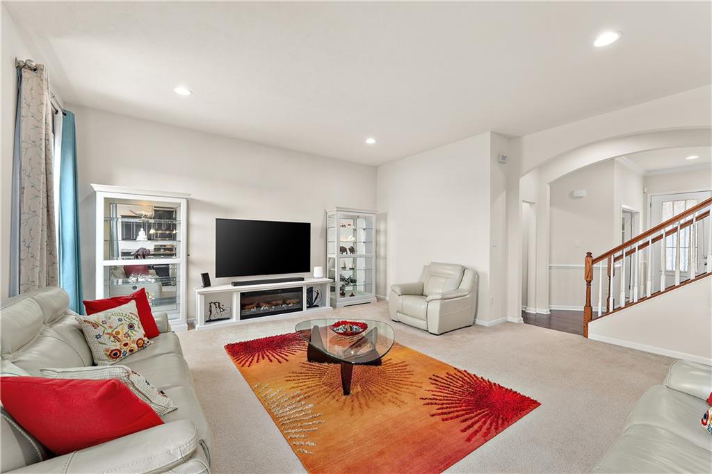 817 Oneida Circle Mars, PA 16046 - Photo 15 of 50 a living room with furniture and a flat screen tv