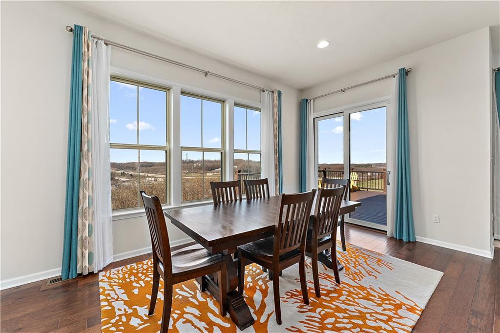 817 Oneida Circle Mars, PA 16046 - Photo 21 of 50 a view of a dining room with furniture window and wooden floor