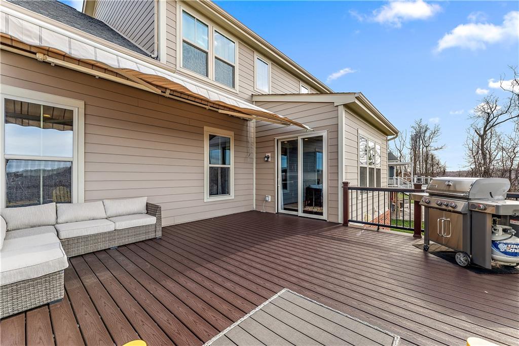817 Oneida Circle Mars, PA 16046 - Photo 23 of 50 a view of a house with pool wooden floor and seating space