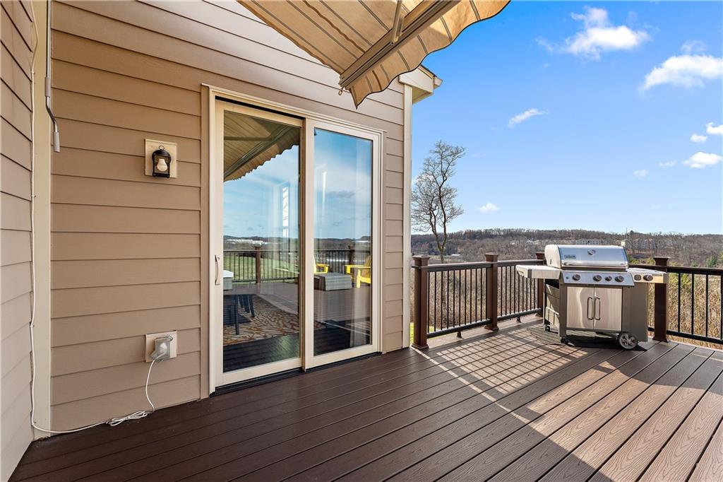 817 Oneida Circle Mars, PA 16046 - Photo 24 of 50 a view of a balcony with wooden floor and fence