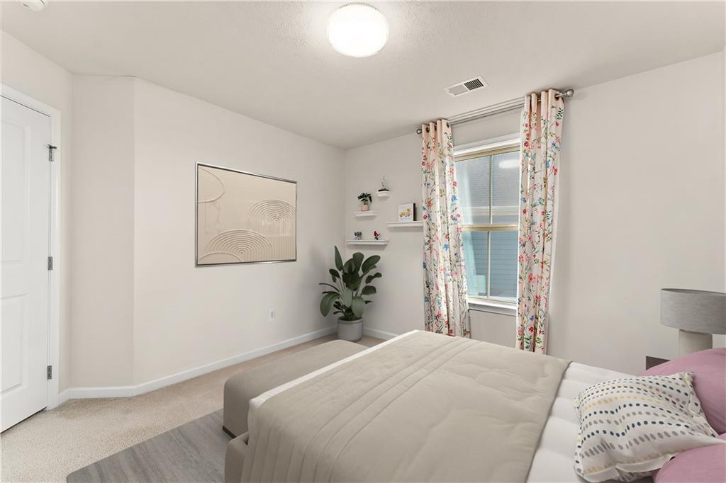 817 Oneida Circle Mars, PA 16046 - Photo 32 of 50 a bedroom with a bed and wooden floor