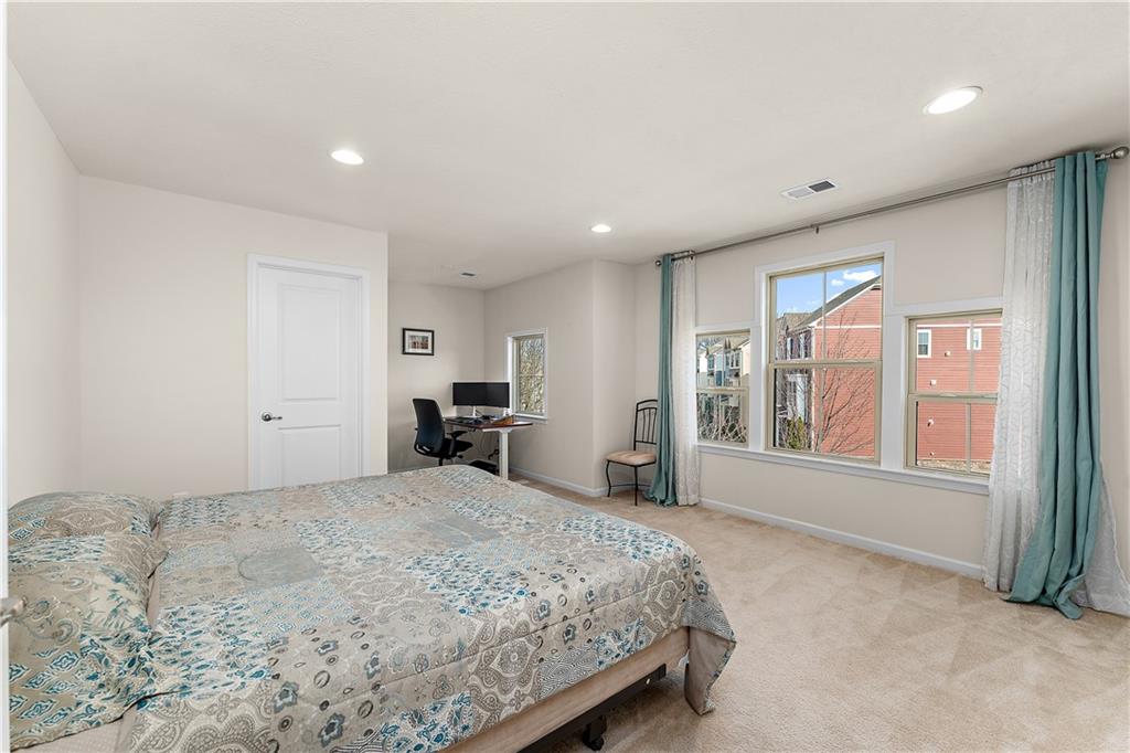 817 Oneida Circle Mars, PA 16046 - Photo 35 of 50 a spacious bedroom with a large bed and a large window