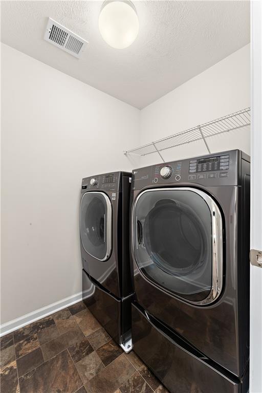 817 Oneida Circle Mars, PA 16046 - Photo 37 of 50 a utility room with dryer and washer