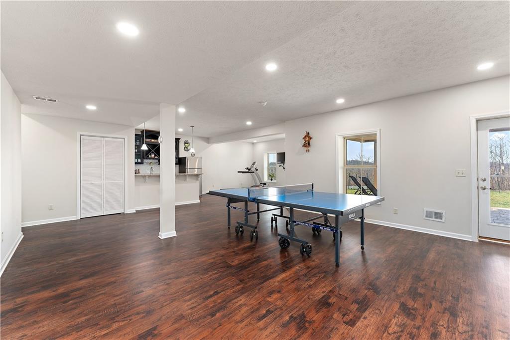 817 Oneida Circle Mars, PA 16046 - Photo 39 of 50 a view of a dining room with furniture and wooden floor