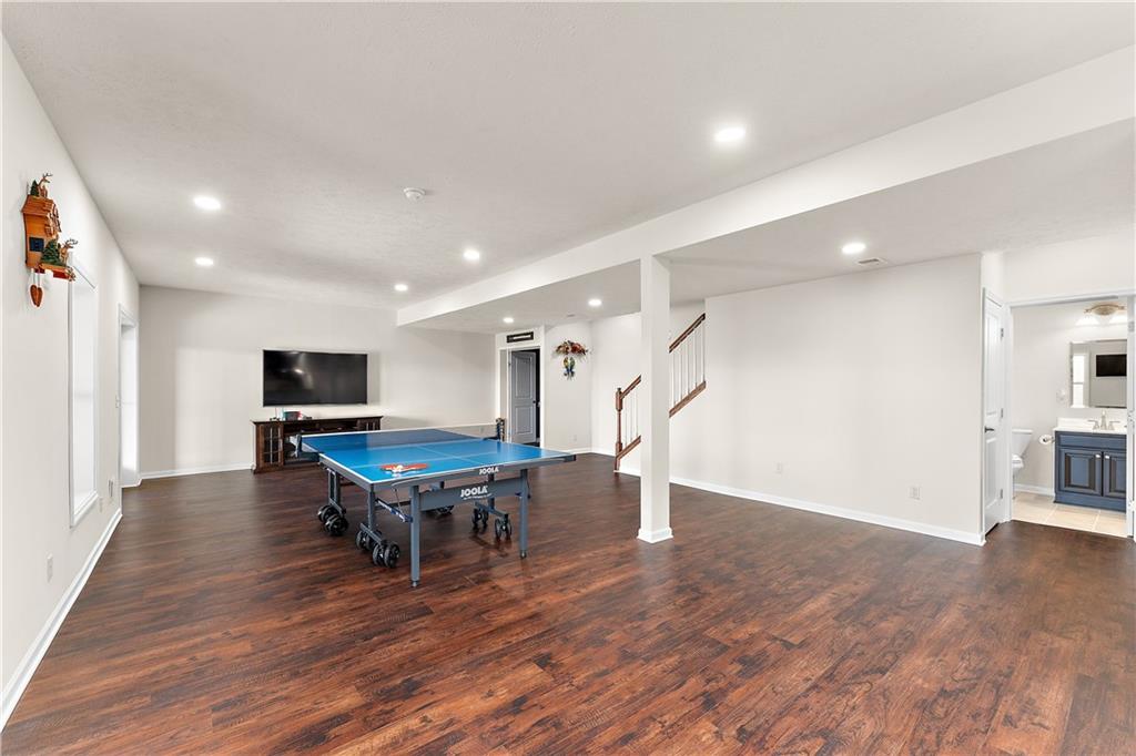 817 Oneida Circle Mars, PA 16046 - Photo 40 of 50 a living room with furniture wooden floor and a flat screen tv