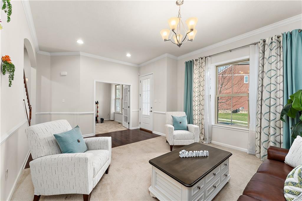 817 Oneida Circle Mars, PA 16046 - Photo 10 of 50 a living room with furniture and a large window