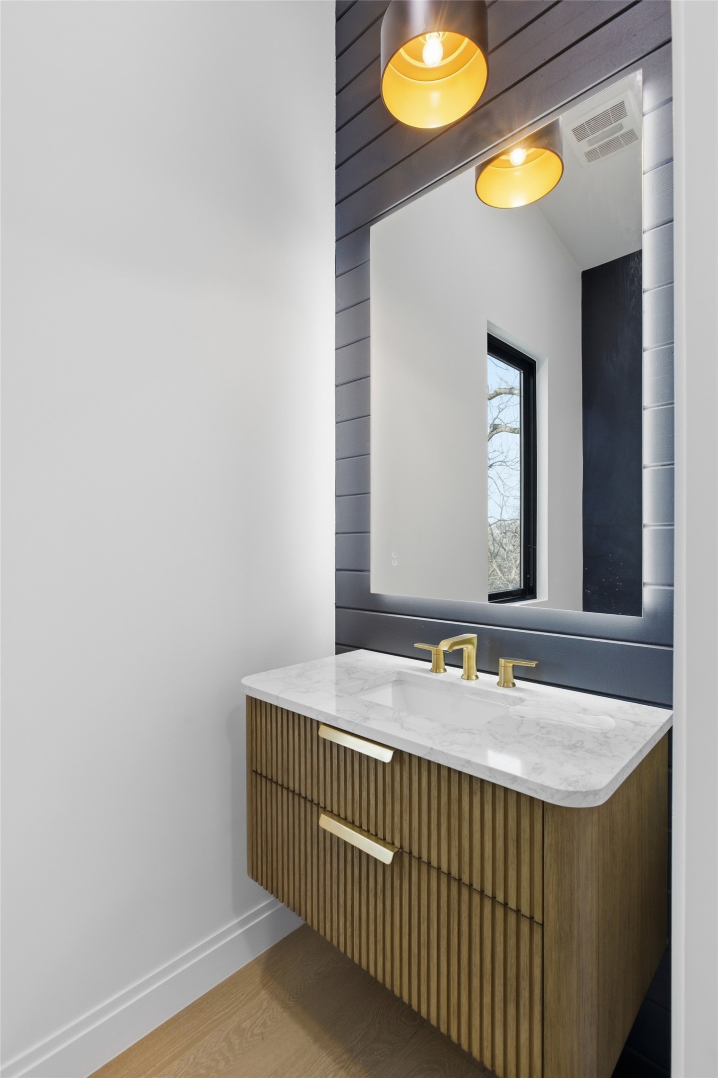 5013 Rob-Scott Street Austin, TX 78721 - Photo 14 of 35 Vanity in upstairs half bathroom.