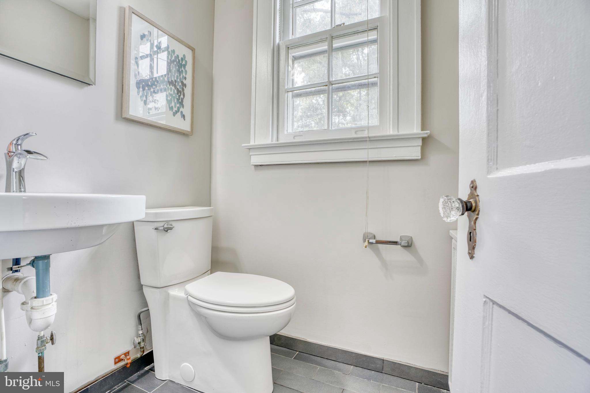 2409 Everton Road Baltimore, MD 21209 - Photo 16 of 37 Main Level Half Bath