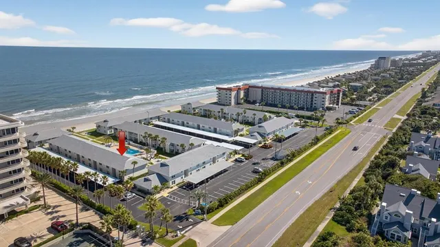 a view of a balcony with chairs