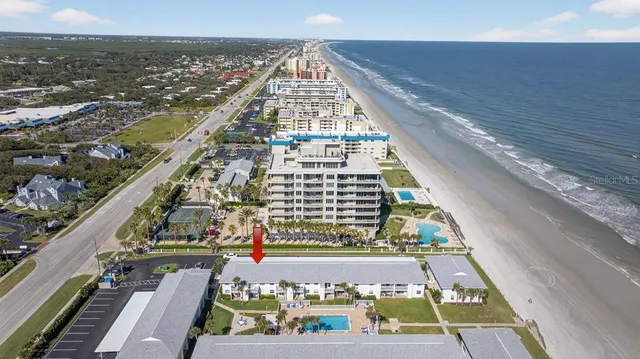a view of balcony with wooden floor