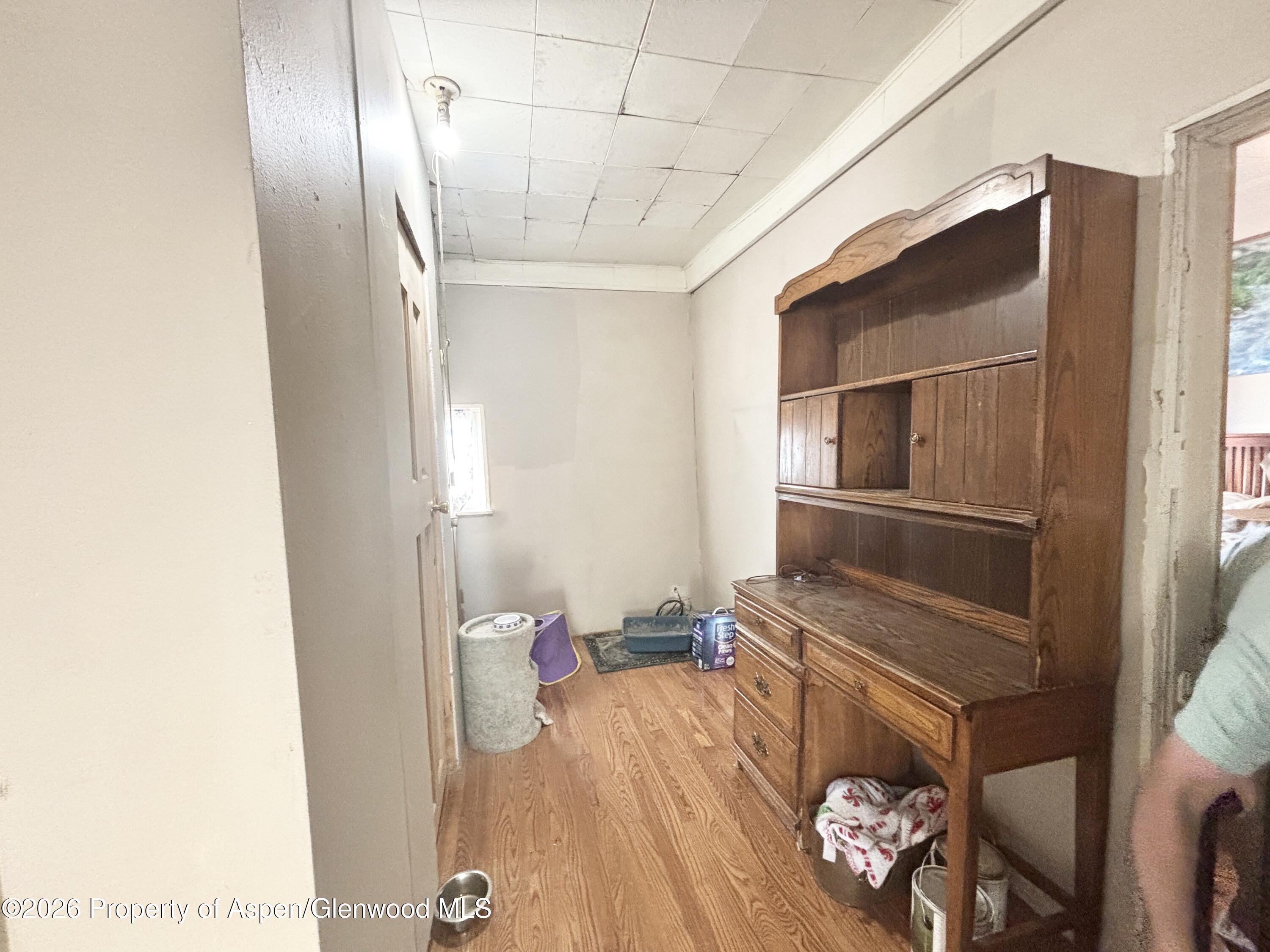 744 Market Street Meeker, CO 81641 - Photo 11 of 17 a view of hallway with livingroom and furniture