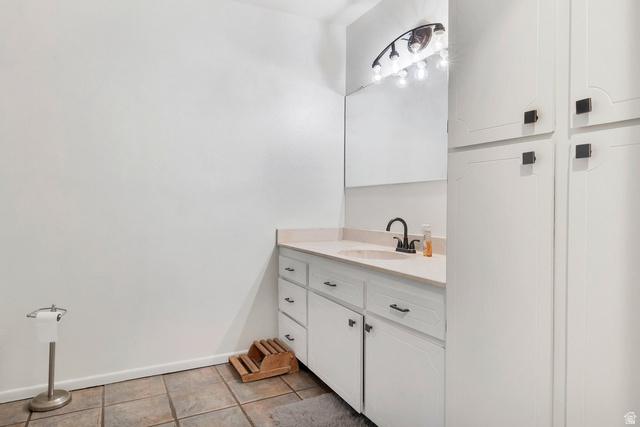 3334 Ute Road St. George, UT 84790 - Photo 13 of 40 Bathroom with vanity and light tile patterned floors