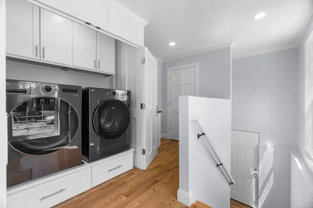 a view of a kitchen with washer and dryer