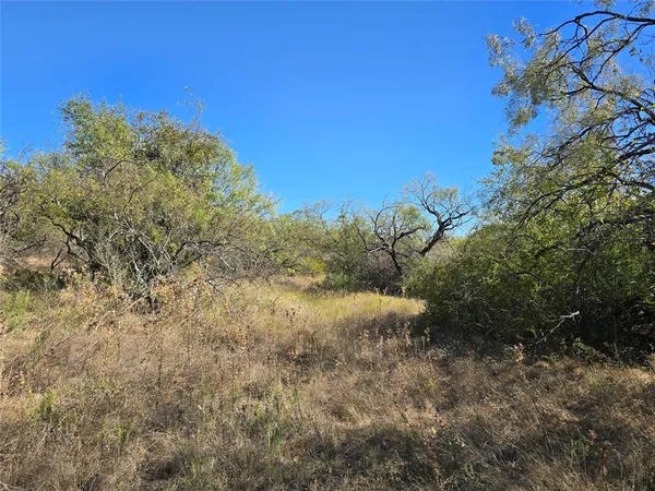 a view of an outdoor space with a lake view
