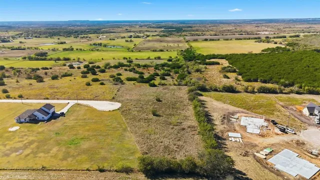 a view of a lake with beach