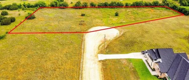 a view of a swimming pool and an outdoor space