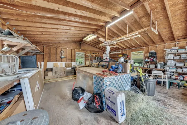 a view of a storage room with racks windows