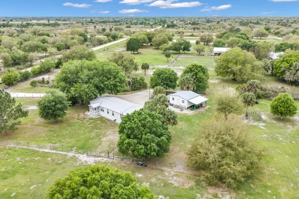 a view of a yard with an outdoor space