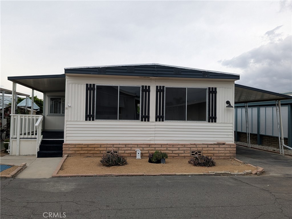 881 North Lake Street, Unit 357 Hemet, CA 92544 - Photo 1 of 29 a view of entrance gate of the house