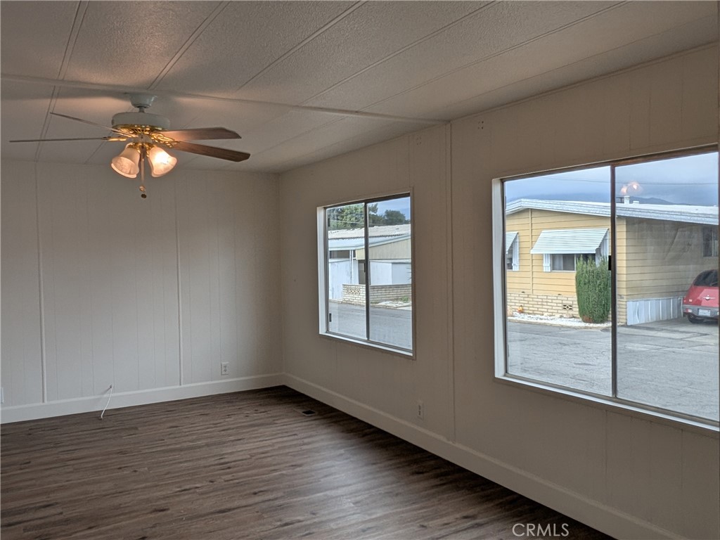 881 North Lake Street, Unit 357 Hemet, CA 92544 - Photo 6 of 29 a view of empty room with wooden floor and fan