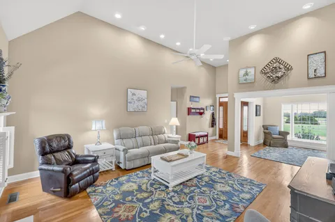a open kitchen with stainless steel appliances granite countertop a stove and cabinets