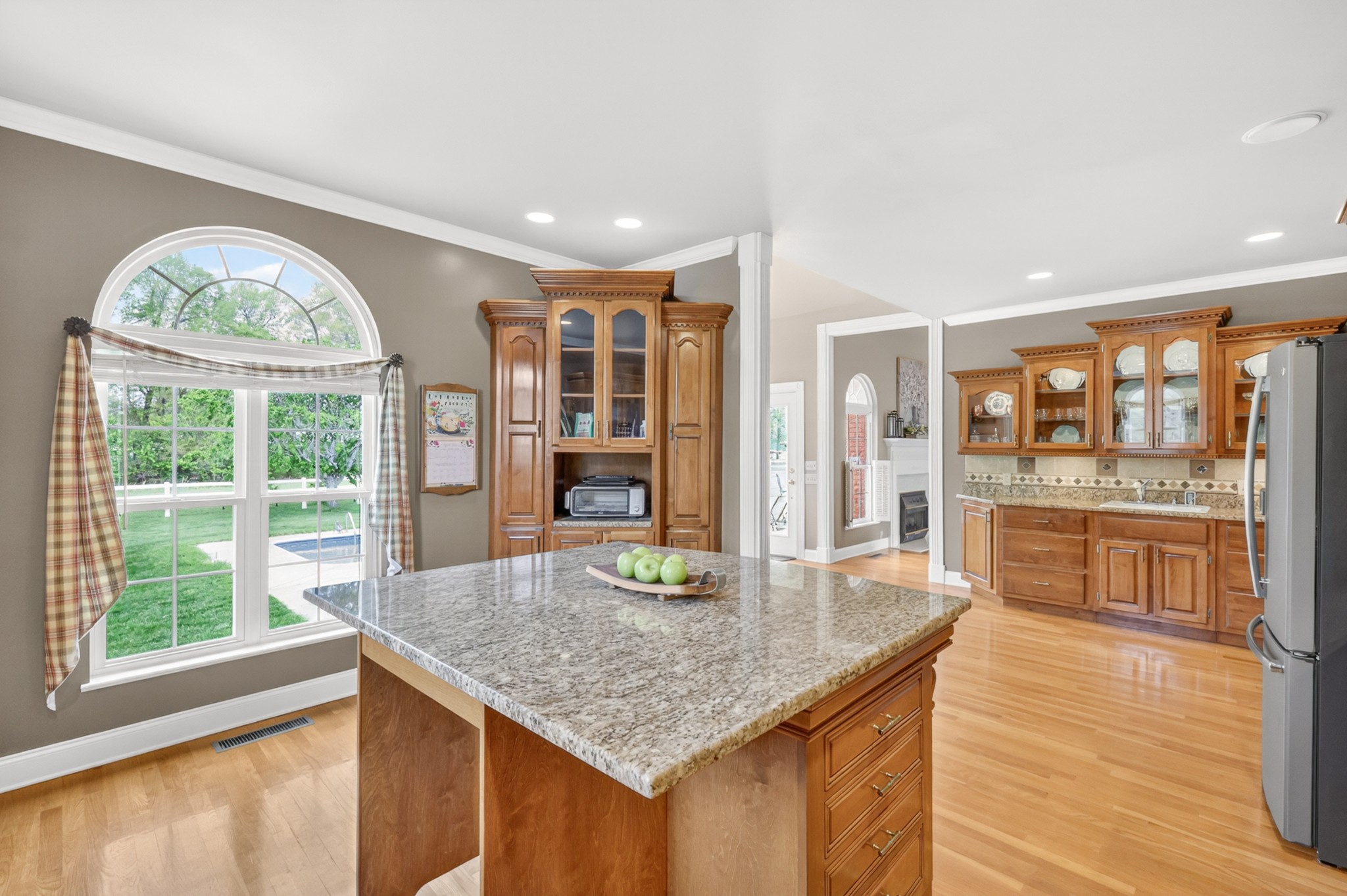 2015 Spry Road Bradyville, TN 37026 - Photo 21 of 77 a kitchen with stainless steel appliances granite countertop a stove and a kitchen island with large windows