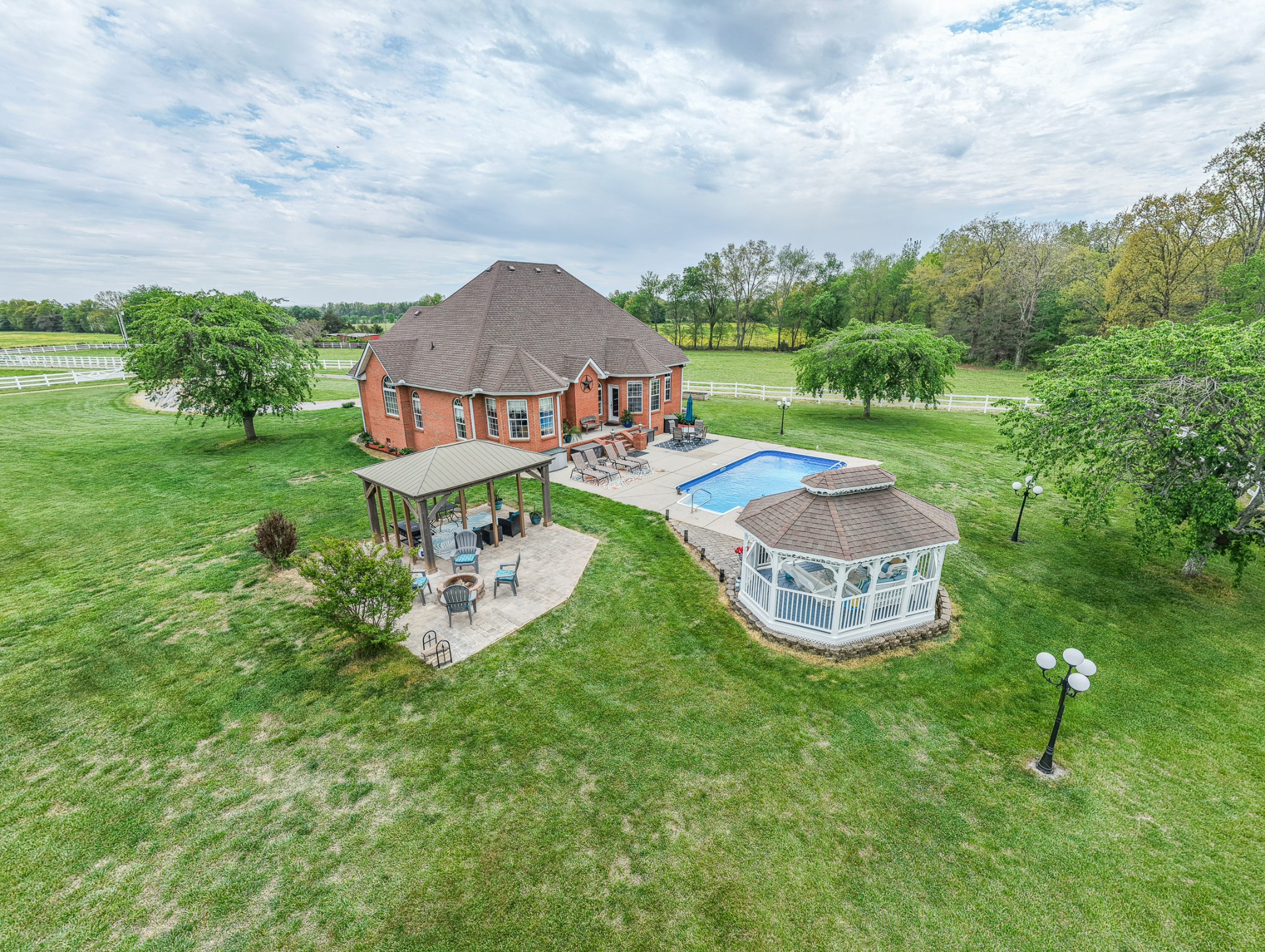 2015 Spry Road Bradyville, TN 37026 - Photo 3 of 77 an aerial view of a house with backyard garden and outdoor seating