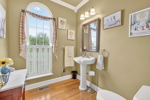 a view of a house with backyard porch and sitting area