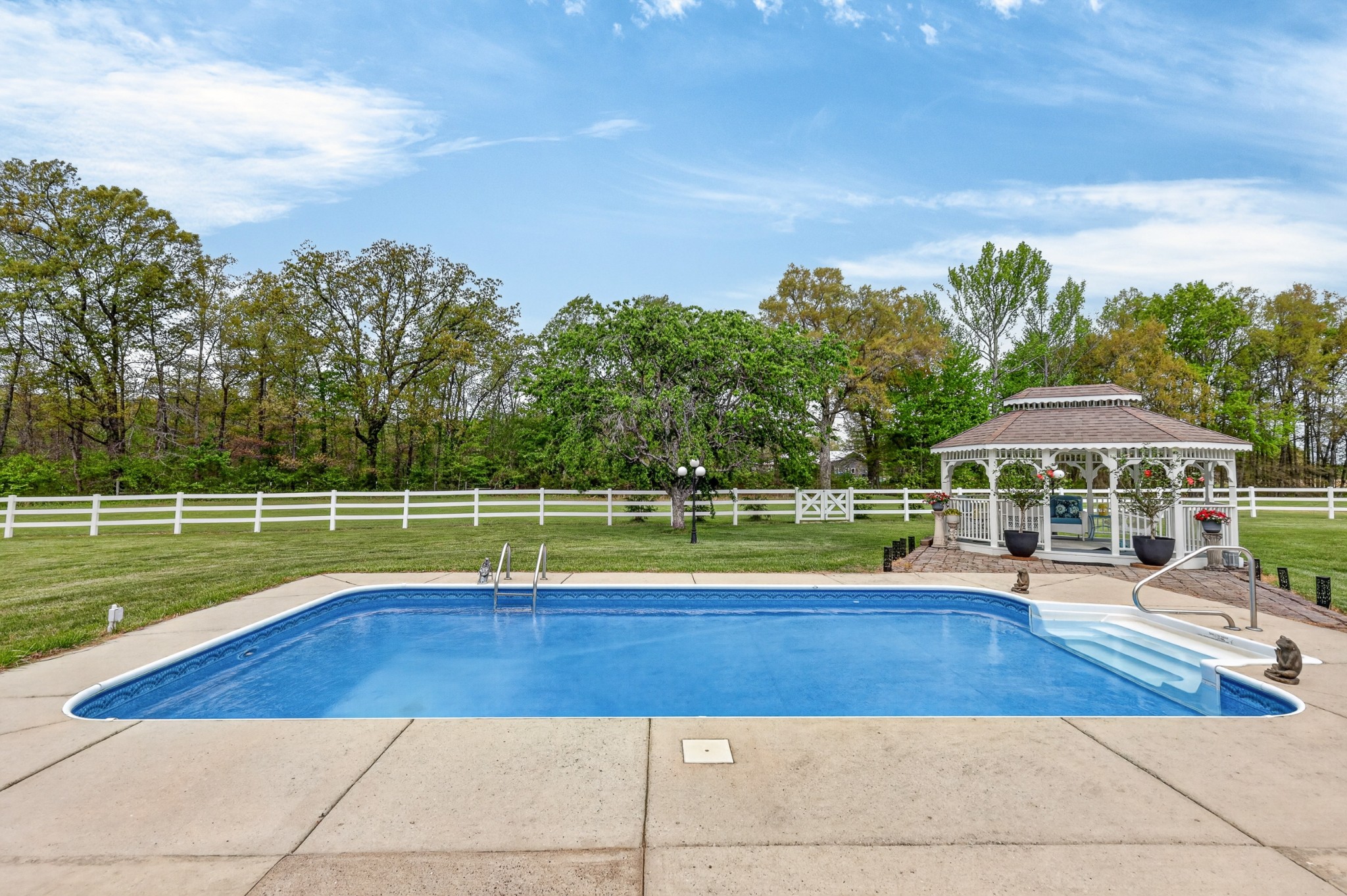 2015 Spry Road Bradyville, TN 37026 - Photo 40 of 77 a view of a house with a swimming pool