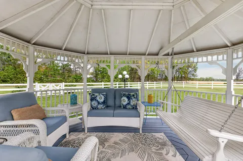 a backyard of a house with lots of green space