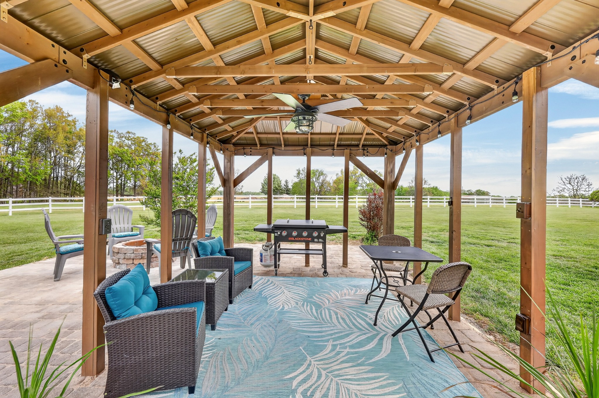 2015 Spry Road Bradyville, TN 37026 - Photo 46 of 77 a roof deck with couch and chairs