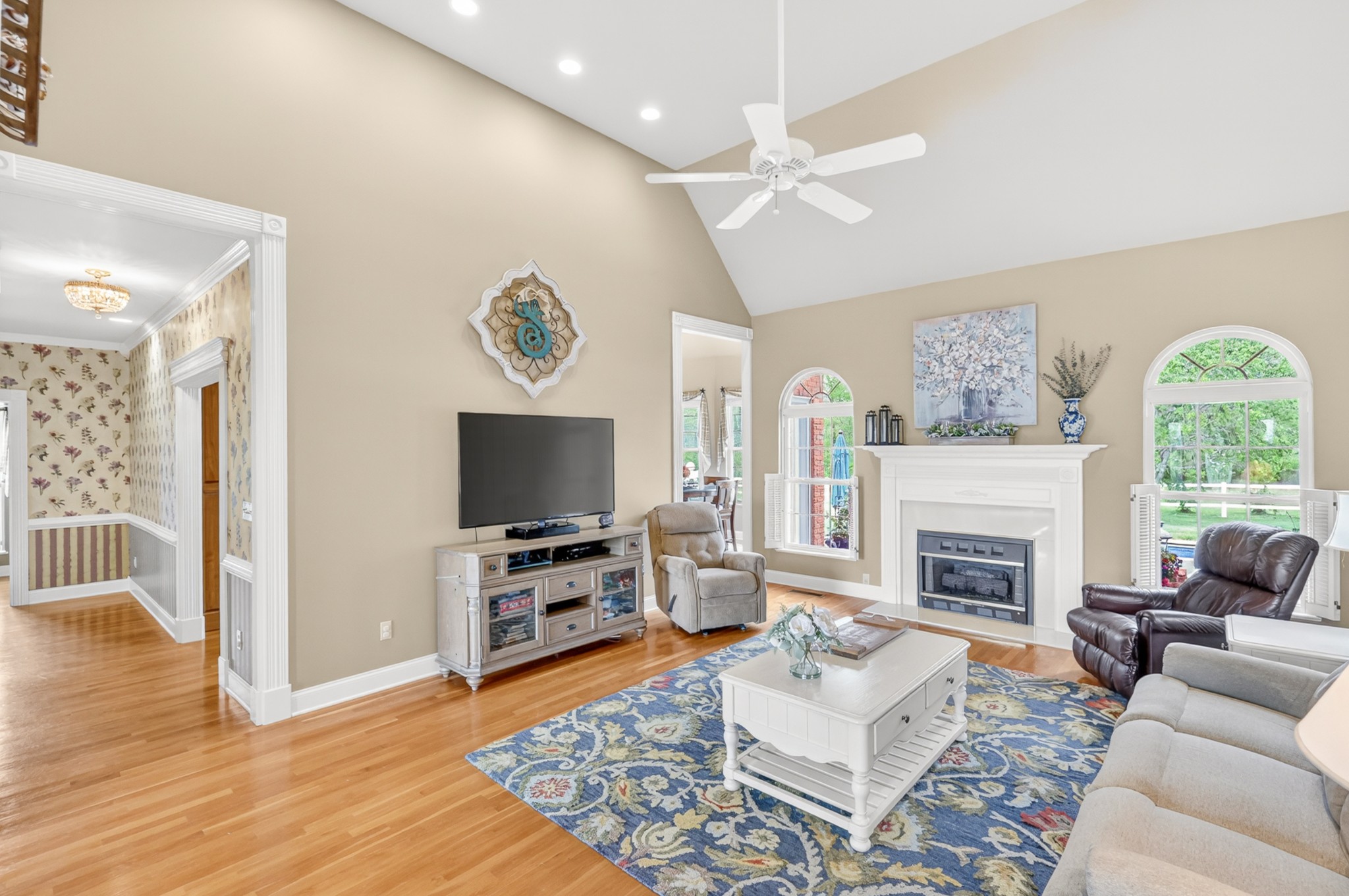 2015 Spry Road Bradyville, TN 37026 - Photo 8 of 77 a living room with furniture a flat screen tv and a fireplace