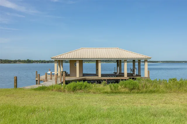 a view of a lake with a building in the background