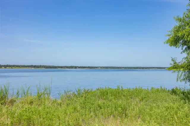 a house view with a backyard space